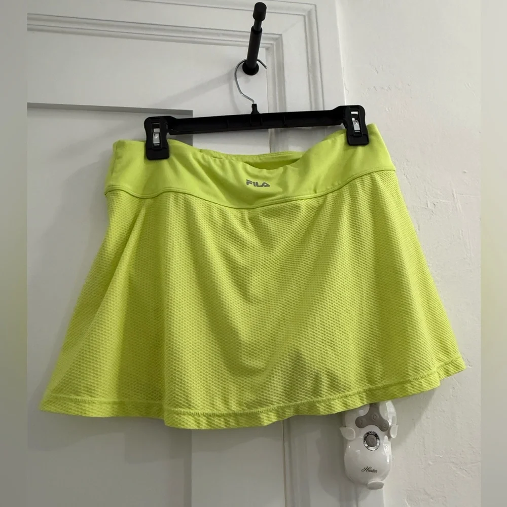 Fila neon yellow green mini skort w/ multicolor butterfly pattern